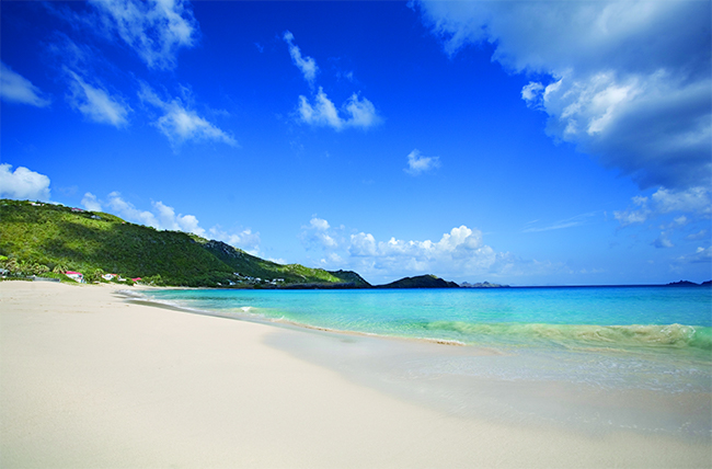 Vista da Praia de Flamand do Baie des Angeles Suites, onde fica o La Langouste